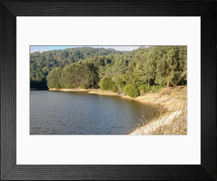 Framed Print : Scenic view of the rio da mula dam surrounded by lush green forest