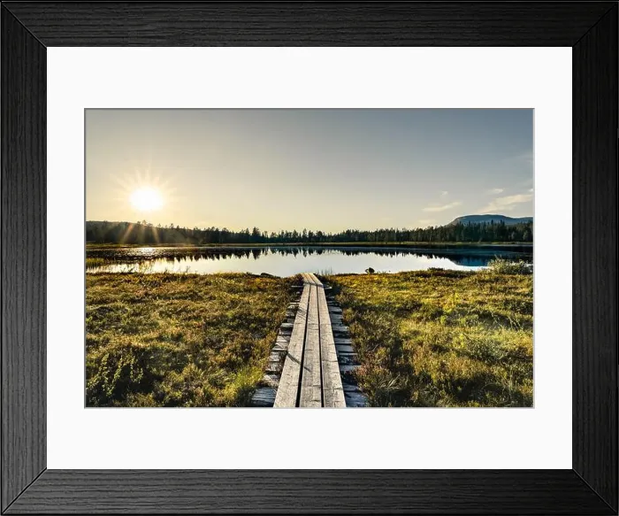 Framed Print : Sunbeams shine over the serene forest lake in Idre Dalarna Framed Print : Sunbeams shine over the serene forest lake in Idre Dalarna