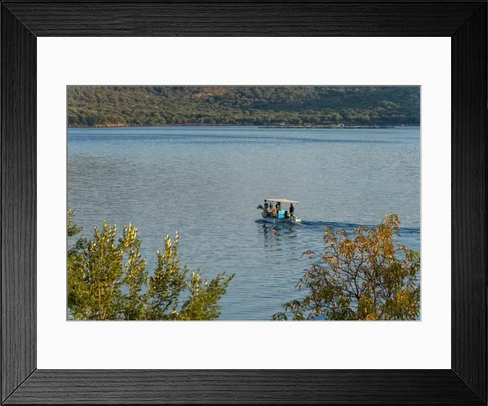Framed Print : small pleasure boat on the shore of Lesbos or Lesvos a Greek island located in the northeastern Aegean Sea Framed Print : small pleasure boat on the shore of Lesbos or Lesvos a Greek island located in the northeastern Aegean Sea