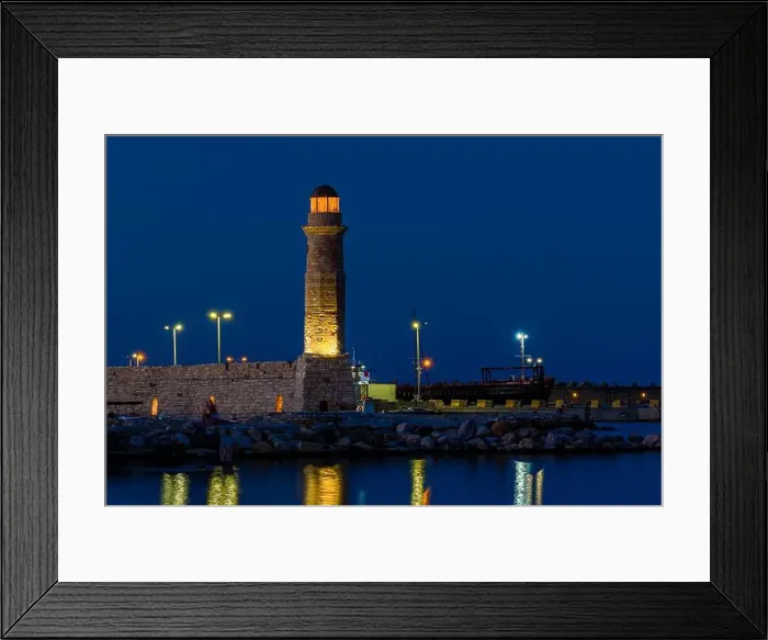 Framed Print : The illuminated Rethymno lighthouse at dusk Framed Print : The illuminated Rethymno lighthouse at dusk