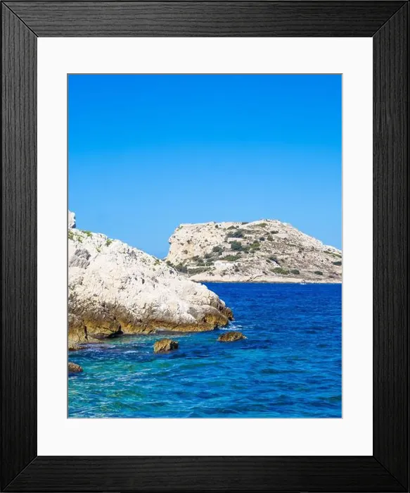 Framed Print : White cliffs on a sunny day in the Bay of Marseille in the Mediterranean Sea near Marseille, France Framed Print : White cliffs on a sunny day in the Bay of Marseille in the Mediterranean Sea near Marseille, France