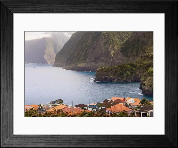 Framed Print : Seixal village and coastline with big cliffs of with the Véu da Noiva waterfall in the background Framed Print : Seixal village and coastline with big cliffs of with the Véu da Noiva waterfall in the background