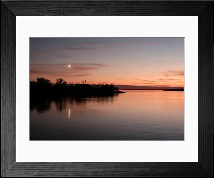 Framed Print : The setting moons magic over Lake Manitoba in Canada