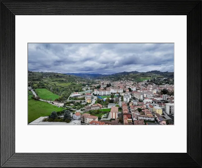 Framed Print : This breathtaking landscape captures the vibrant town of Alba in Italy