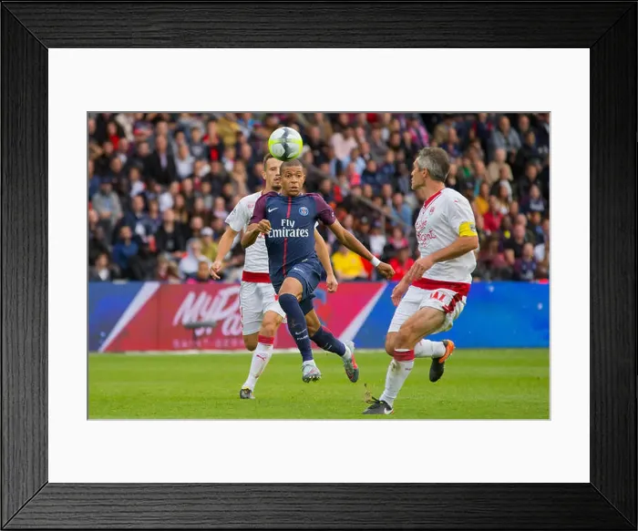 Framed Print : Kylian Mbappe in action during the French Ligue 1 soccer match between Paris saint Germain (Ps G) Framed Print : Kylian Mbappe in action during the French Ligue 1 soccer match between Paris saint Germain (Ps G)