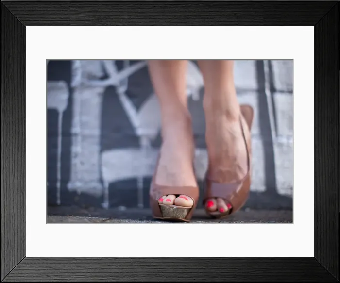 Framed Print : peep toe shoes with bright toe nails