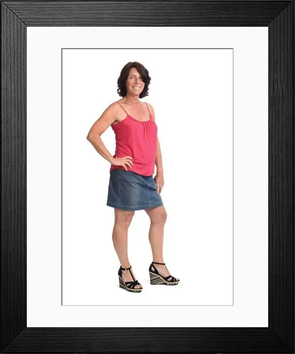 Framed Print : woman with denim skirt on white background, hand son hip