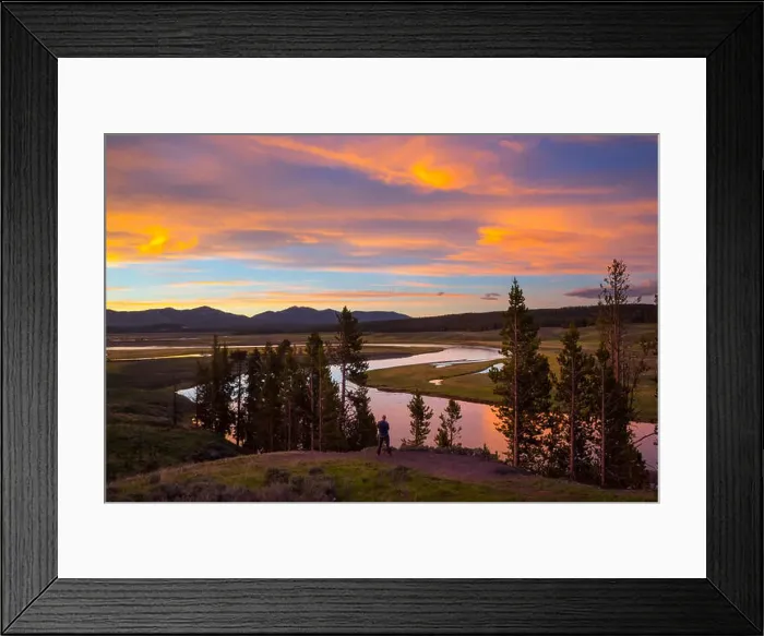 Framed Print : Man taking a photo at Yellowstone River in Hayden Valley at sunset Framed Print : Man taking a photo at Yellowstone River in Hayden Valley at sunset