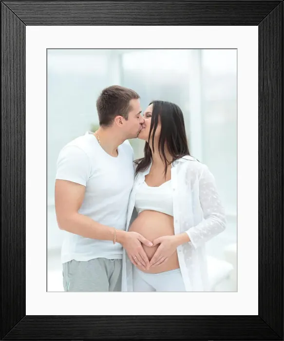 Framed Print : beautiful pregnant woman and her handsome husband Framed Print : beautiful pregnant woman and her handsome husband