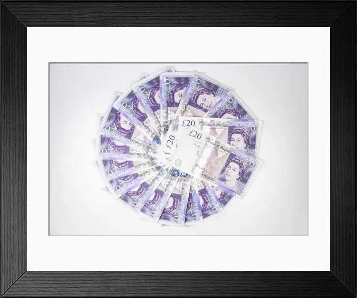 Framed Print : Looking down on a circle of Twenty pound notes on a table Framed Print : Looking down on a circle of Twenty pound notes on a table