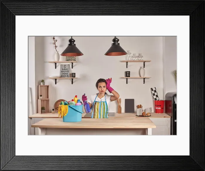 Framed Print : Emotional Housekeeper. Beautiful woman cleaning kitchen Framed Print : Emotional Housekeeper. Beautiful woman cleaning kitchen