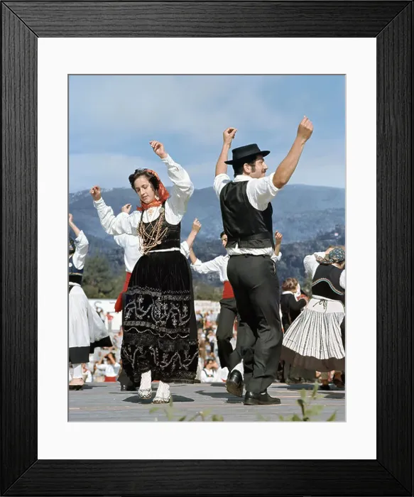 Framed Print : folk dance couple in Regional costume in the Minho, Northern Portugal Framed Print : folk dance couple in Regional costume in the Minho, Northern Portugal