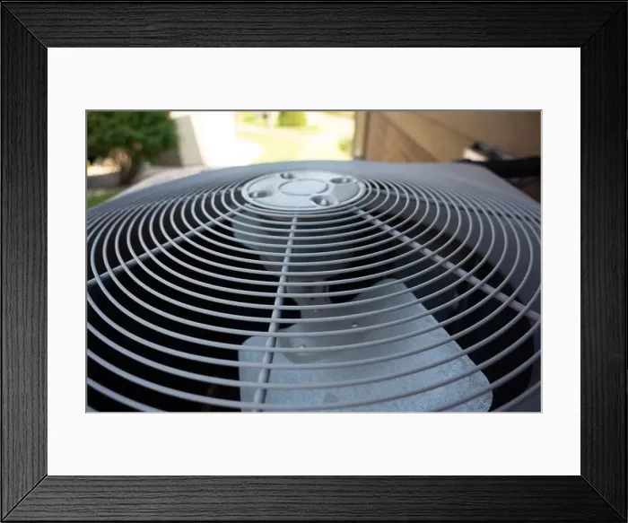Framed Print : Top view of Residential air conditioning unit outdoors with fan and coils Framed Print : Top view of Residential air conditioning unit outdoors with fan and coils