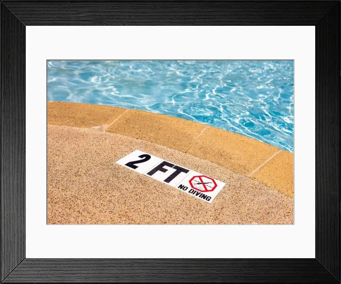 Framed Print : Edge of swimming pool with NO Diving warning sign and 2 ft depth marker Framed Print : Edge of swimming pool with NO Diving warning sign and 2 ft depth marker