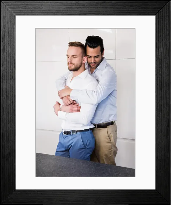 Framed Print : Gay couple with eyes closed hugging Framed Print : Gay couple with eyes closed hugging
