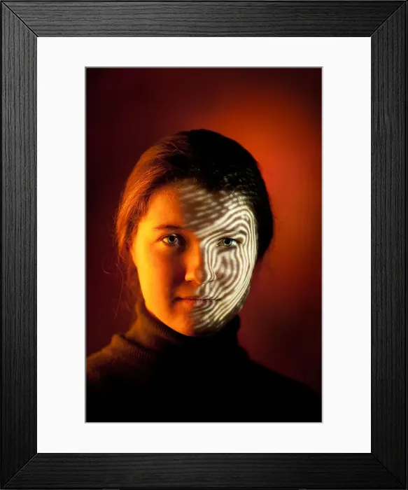 Framed Print : Girl with fingerprint projected on face Framed Print : Girl with fingerprint projected on face
