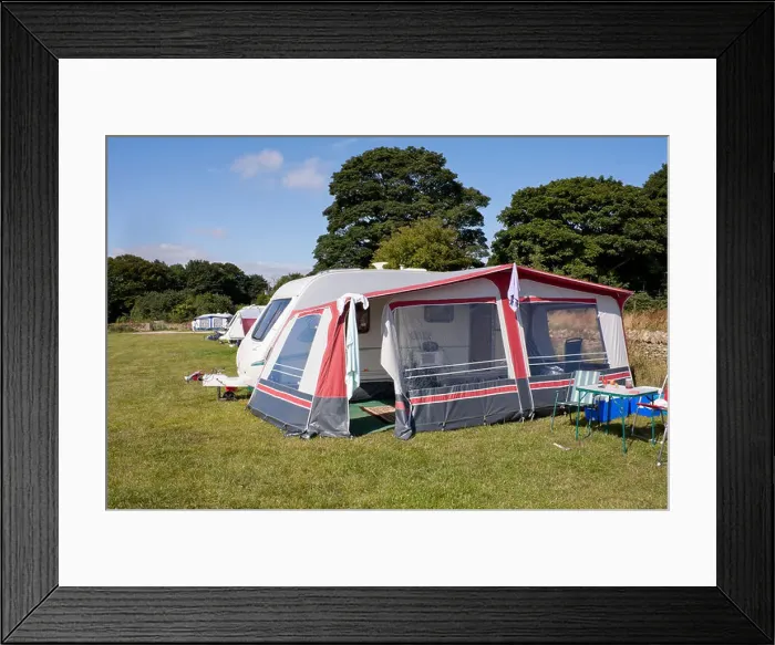 Framed Print : Caravan and awning set up for holiday / vacation on Caravan site in countryside of Yorkshire, England Framed Print : Caravan and awning set up for holiday / vacation on Caravan site in countryside of Yorkshire, England