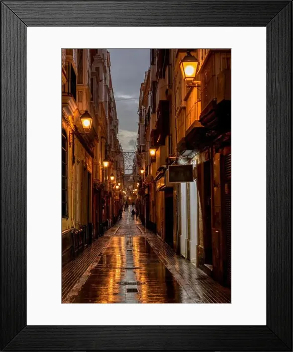 Framed Print : Night view of a typical street in the downtown of Cadiz, Andalusia, Spain Framed Print : Night view of a typical street in the downtown of Cadiz, Andalusia, Spain