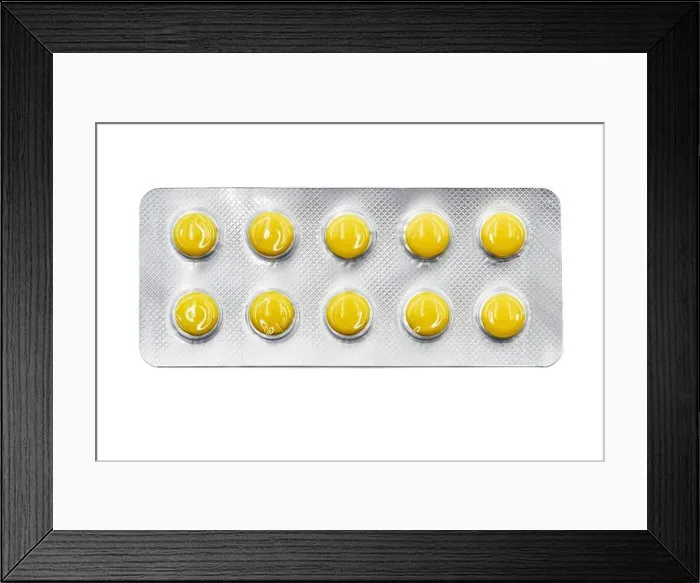Framed Print : Yellow pills in blister pack isolated on white background. Global pharmaceutical industry. Closeup, top view Framed Print : Yellow pills in blister pack isolated on white background. Global pharmaceutical industry. Closeup, top view