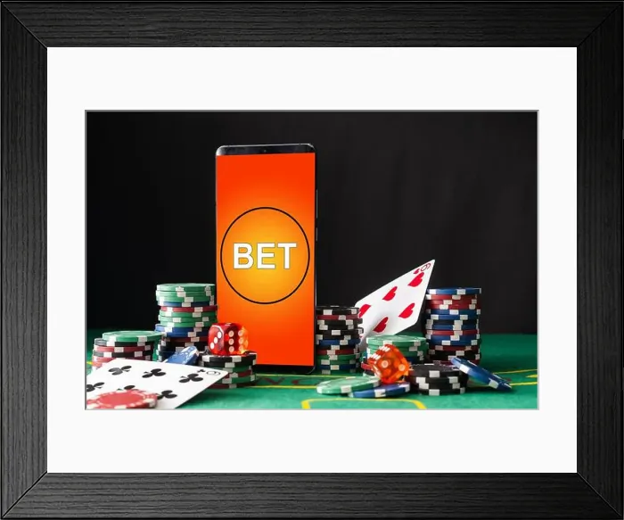 Framed Print : Online Poker casino banner with a mobile phone Framed Print : Online Poker casino banner with a mobile phone