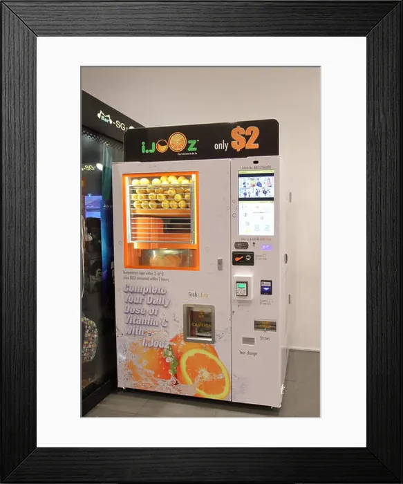 Framed Print : Fresh orange squeeze juice vending machine in Singapore Framed Print : Fresh orange squeeze juice vending machine in Singapore