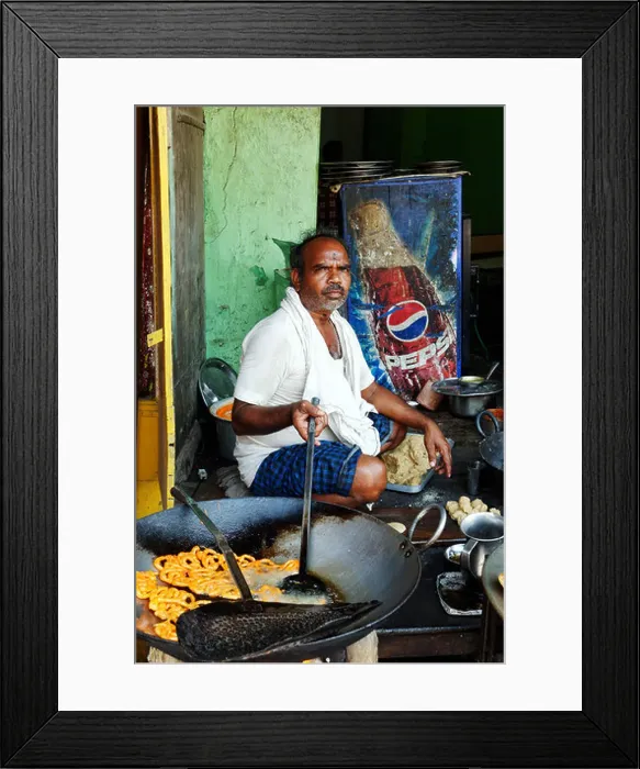 Framed Print : An Indian man cooking street food Framed Print : An Indian man cooking street food