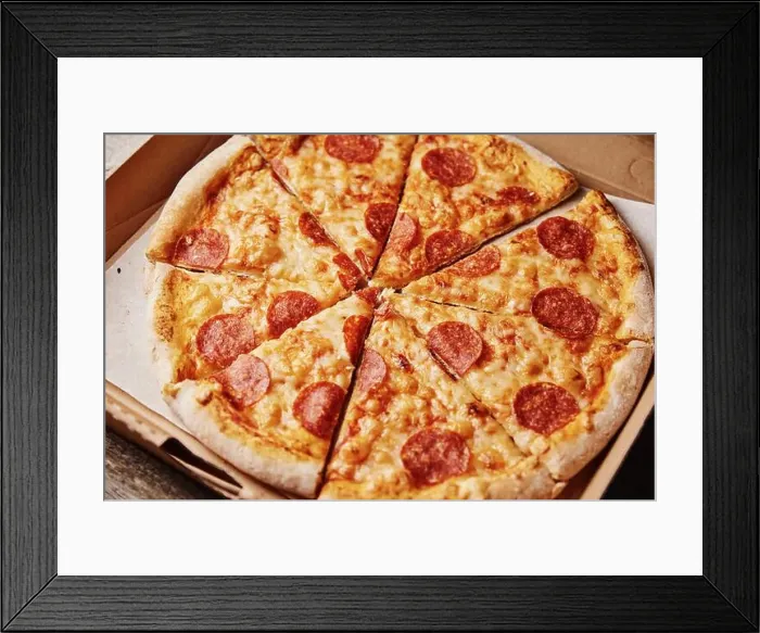 Framed Print : Slice of pizza in cardboard box, close up Framed Print : Slice of pizza in cardboard box, close up