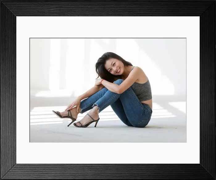 Framed Print : Portrait beautiful Asian girl sitting on the ground Framed Print : Portrait beautiful Asian girl sitting on the ground
