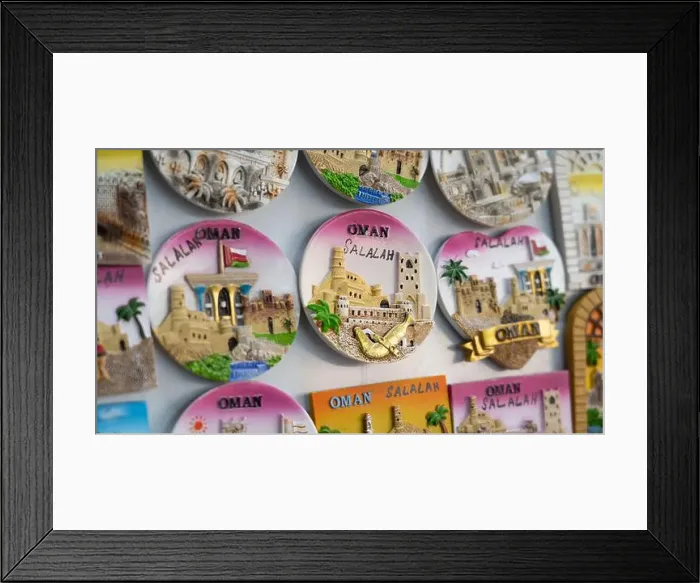 Framed Print : Salalalah, Oman -November 11.2023 : fridge magnets as souvenirs can be found at Al-Husn Souq in Salalah Framed Print : Salalalah, Oman -November 11.2023 : fridge magnets as souvenirs can be found at Al-Husn Souq in Salalah