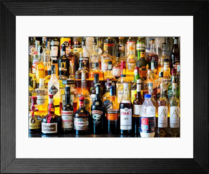 Framed Print : Hard alcohol bottles in a bar Framed Print : Hard alcohol bottles in a bar