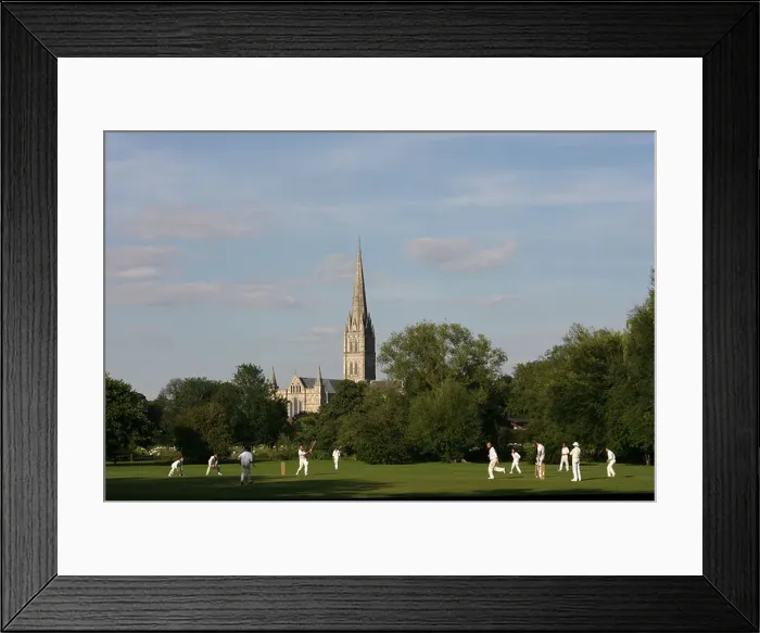 Framed Print : A Cricket Match being played within sight of Salisbury Cathedral, Wiltshire. UK Framed Print : A Cricket Match being played within sight of Salisbury Cathedral, Wiltshire. UK