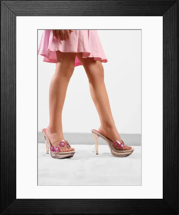 Framed Print : Low section view of a girl wearing oversized sandals Framed Print : Low section view of a girl wearing oversized sandals