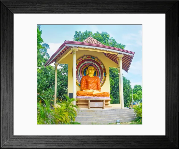 Framed Print : The colorful statue of Meditating Buddha surrounded by greenery of Halpanwila Temple garden, Mahawewa, Sri Lanka Framed Print : The colorful statue of Meditating Buddha surrounded by greenery of Halpanwila Temple garden, Mahawewa, Sri Lanka