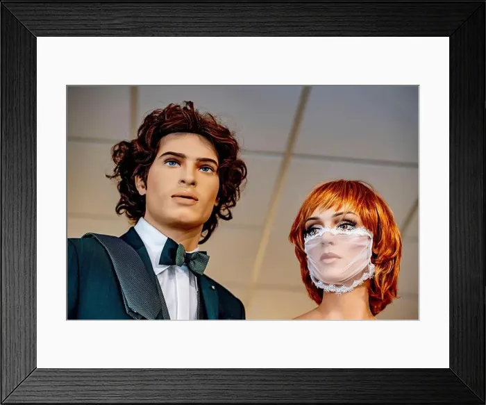 Framed Print : A view male and female mannequins dressed in bridal wear with the female mannequin wearing a laced bridal facemask Framed Print : A view male and female mannequins dressed in bridal wear with the female mannequin wearing a laced bridal facemask