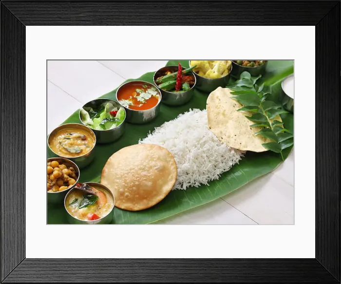 Framed Print : meals served on banana leaf, traditional south indian cuisine Framed Print : meals served on banana leaf, traditional south indian cuisine