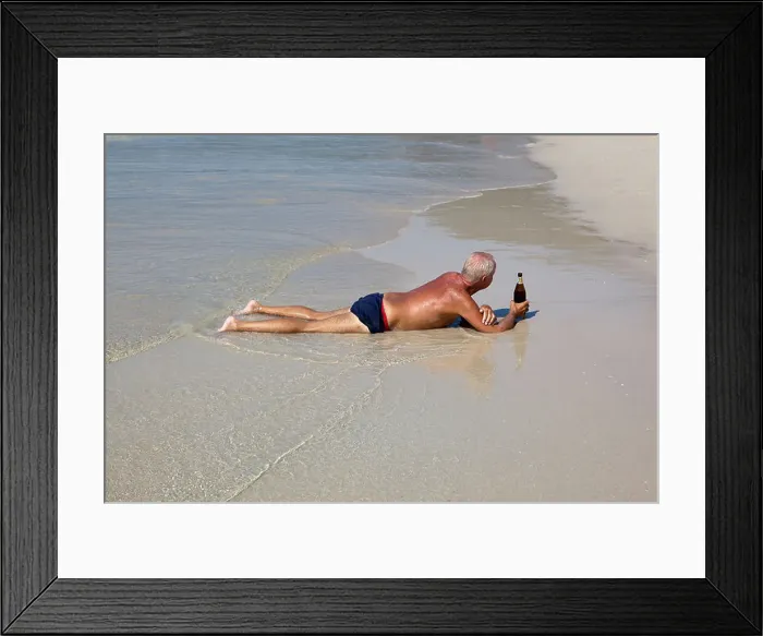 Framed Print : Man lying on Patpong Beach with a bottle of Beer Framed Print : Man lying on Patpong Beach with a bottle of Beer