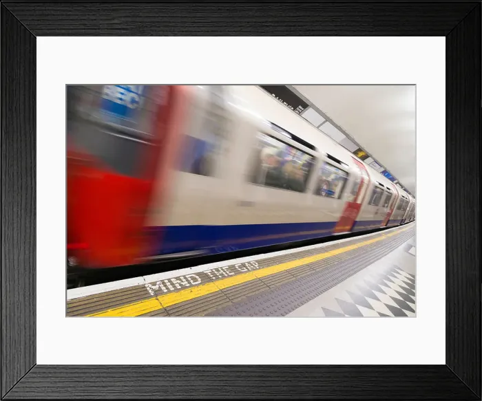 Framed Print : Train leaving London Underground station, England UK Framed Print : Train leaving London Underground station, England UK