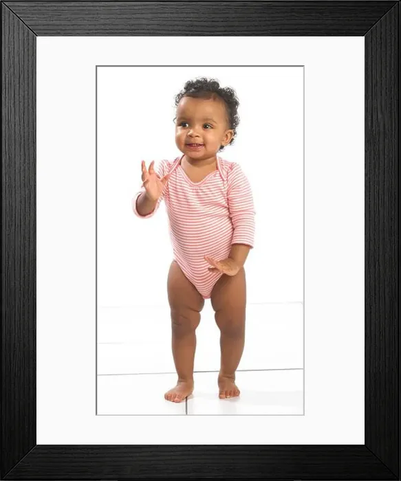 Framed Print : Girl standing up, 18 months Framed Print : Girl standing up, 18 months