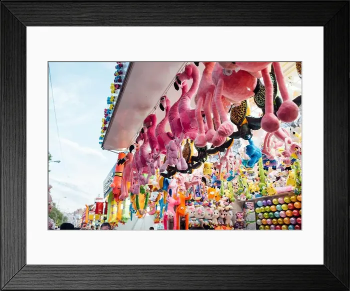 Framed Print : From below set of various toy prizes hanging on stall during fair in amusement park Framed Print : From below set of various toy prizes hanging on stall during fair in amusement park