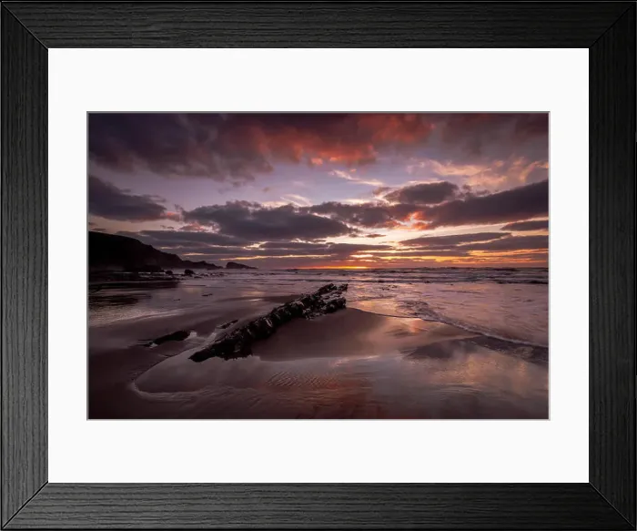 Framed Print : Sunset at Welcombe Mouth Beach in North Devon, UK. There is a beautiful orange sky, pristine sands and nice clouds Framed Print : Sunset at Welcombe Mouth Beach in North Devon, UK. There is a beautiful orange sky, pristine sands and nice clouds