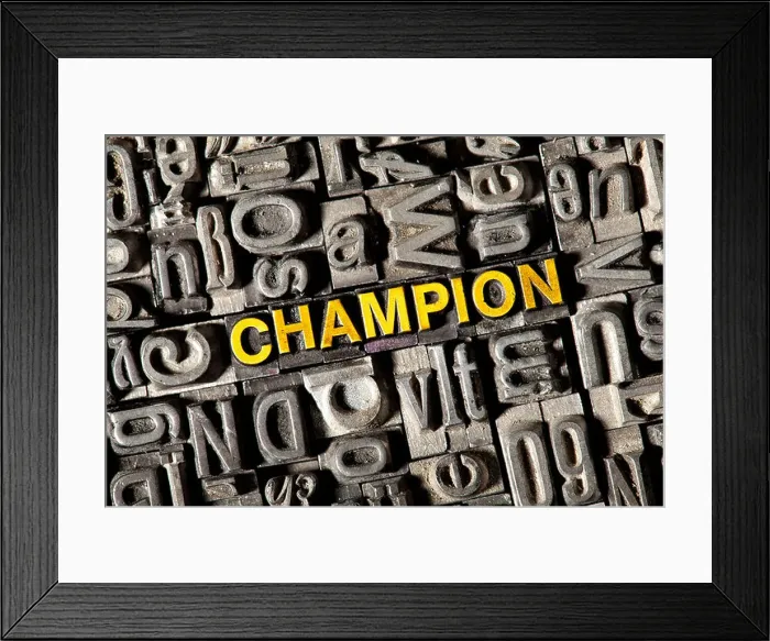 Framed Print : Old lead letters forming the word champion Framed Print : Old lead letters forming the word champion