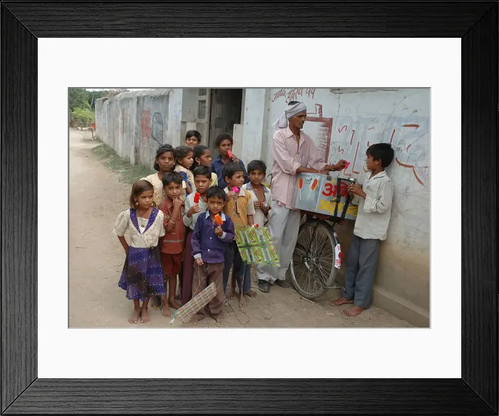 Framed Print : School going children eating red color ice cream in Village Manghawa District Narsinghpur Madhya Pradesh India - ANA Framed Print : School going children eating red color ice cream in Village Manghawa District Narsinghpur Madhya Pradesh India - ANA