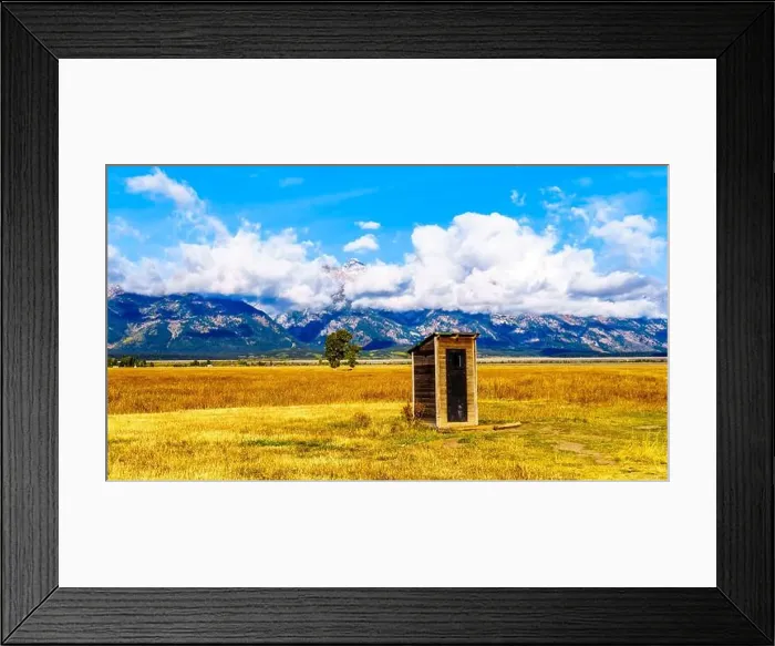 Framed Print : An Outhouse at Mormon Row with in the background cloud covered Peaks of the Grand Tetons In Grand Tetons National Park Framed Print : An Outhouse at Mormon Row with in the background cloud covered Peaks of the Grand Tetons In Grand Tetons National Park