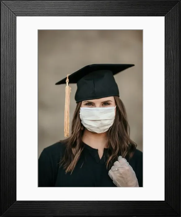 Framed Print : Girl graduate in graduation cap and covid 19 mask Framed Print : Girl graduate in graduation cap and covid 19 mask