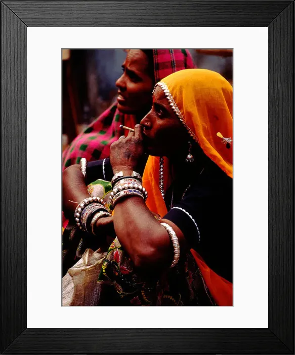 Framed Print : Traditional Rajasthani Woman smoking biddi at Pushkar Mela Rajasthan India Framed Print : Traditional Rajasthani Woman smoking biddi at Pushkar Mela Rajasthan India