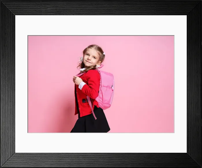 Framed Print : Back to school. Child with schoolbag Framed Print : Back to school. Child with schoolbag