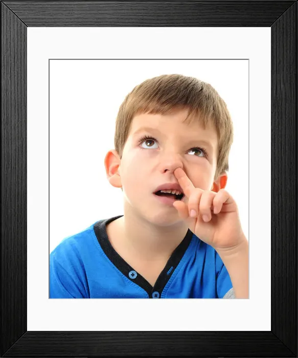 Framed Print : Boy picking his nose, young child picking their nose Framed Print : Boy picking his nose, young child picking their nose