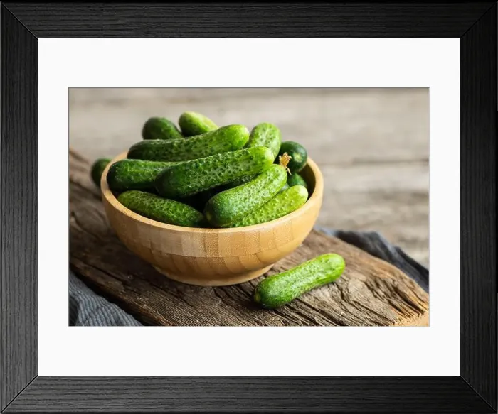 Framed Print : Fresh ripe organic small gherkin cucumbers in bowl or basket on rustic table, not marinated vegetable, cornichon Framed Print : Fresh ripe organic small gherkin cucumbers in bowl or basket on rustic table, not marinated vegetable, cornichon