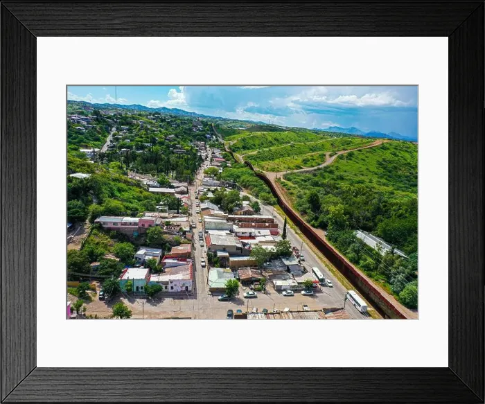 Framed Print : Aerial view of the border wall in Nogales Sonora (L) in Mexico and Nogales Arizona (R) in the United States Framed Print : Aerial view of the border wall in Nogales Sonora (L) in Mexico and Nogales Arizona (R) in the United States