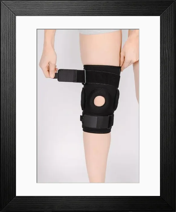 Framed Print : Knee Support Brace on leg isolated on white background Framed Print : Knee Support Brace on leg isolated on white background